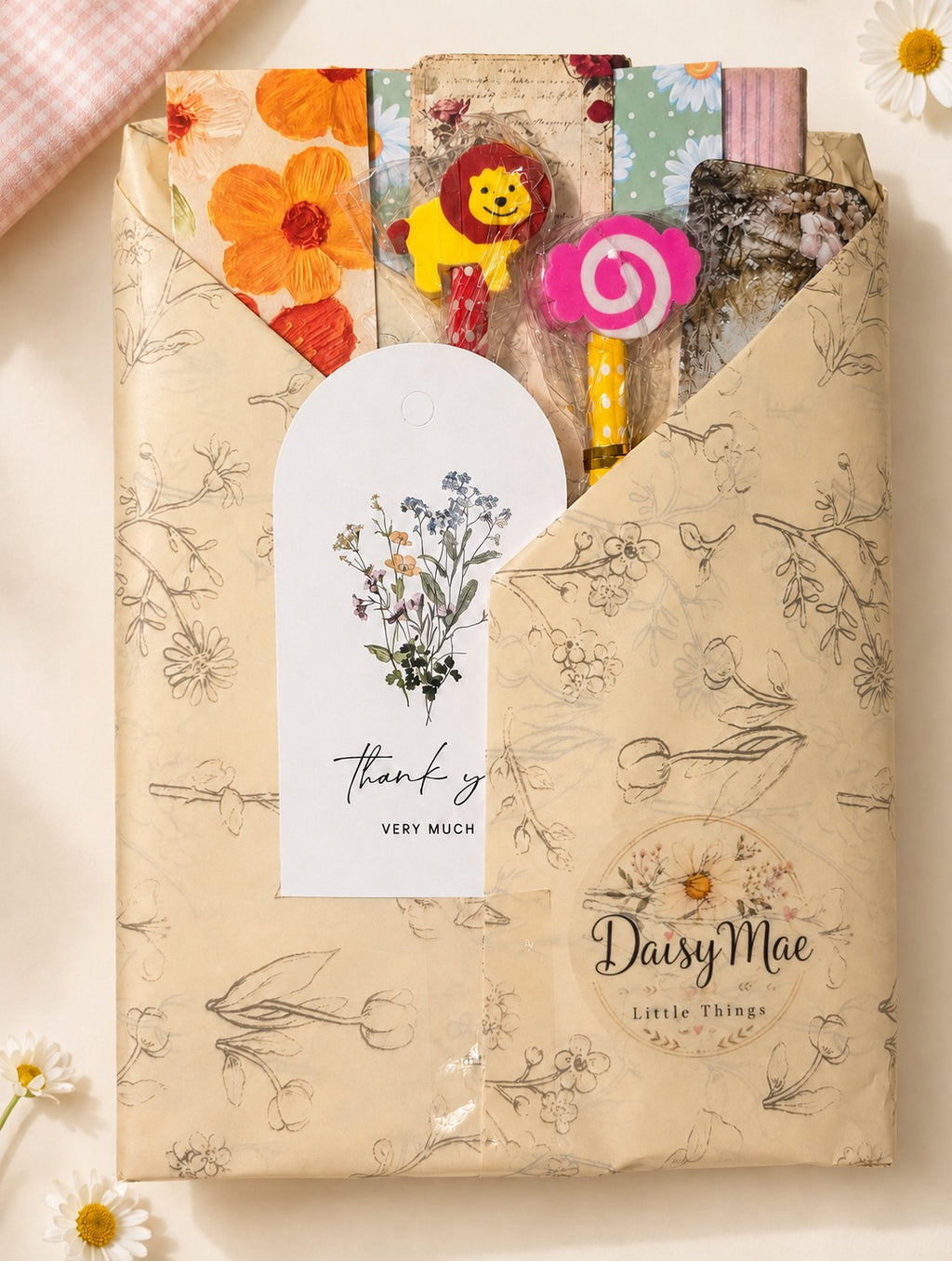 Daisy Mae Mystery Pack wrapped in floral tissue paper with branded gift tag