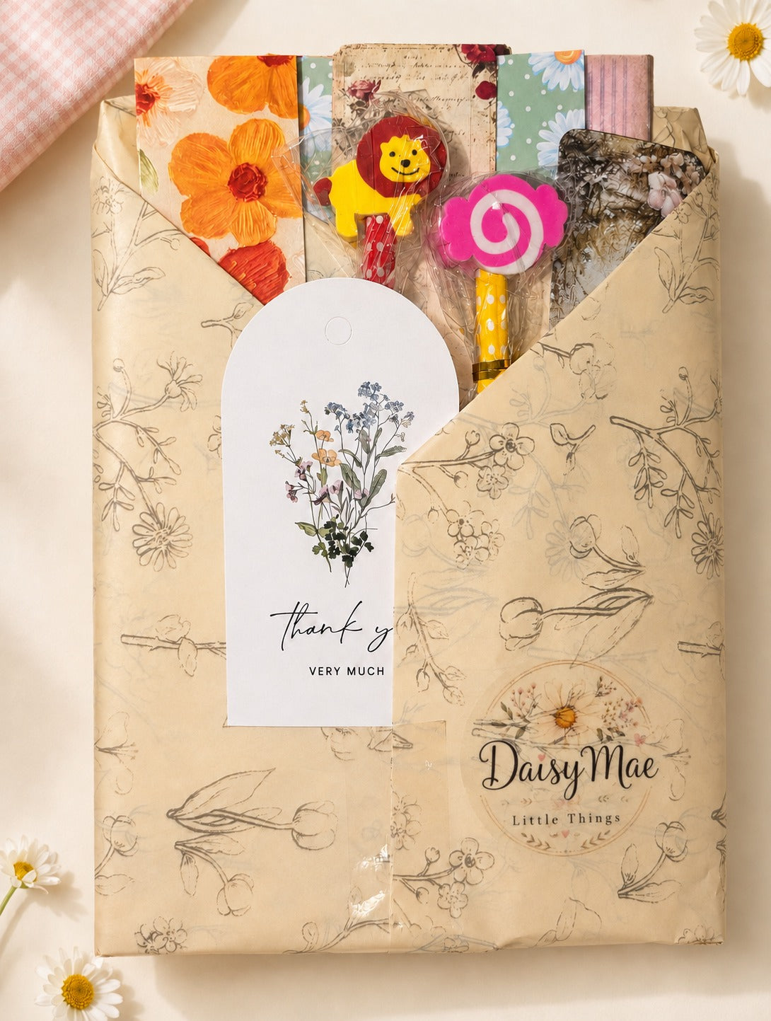 Daisy Mae Mystery Pack wrapped in floral tissue paper with branded gift tag